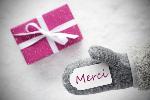 Rosa Geschenk, Handschuh, merci bedeutet Danke, Schneeflocken — Stockfoto