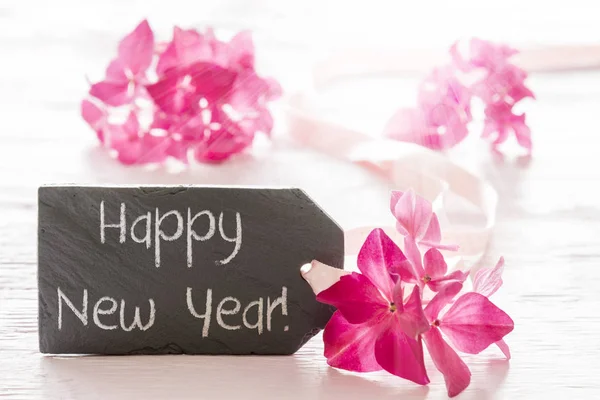 Rosa Hortensienblüte, Text frohes neues Jahr — Stockfoto