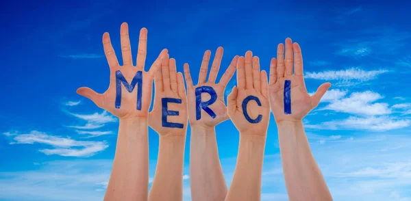 Many Hands Building Merci Means Thank You, Blue Sky — Stock Photo, Image