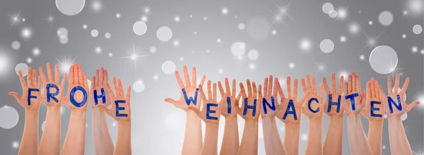 Hands Building Word Frohe Weihnachten Means Merry Christmas, Gray Background — Stock Photo, Image