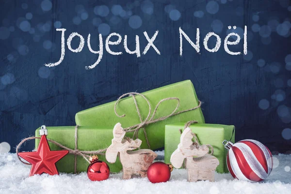 Grön jul gåvor, snö, Joyeux Noel betyder god jul — Stockfoto