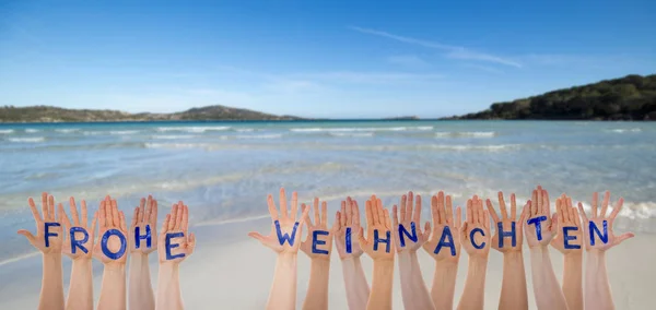 Hands Building Frohe Weihnachten Means Merry Christmas, Beach And Ocean — Stock Photo, Image