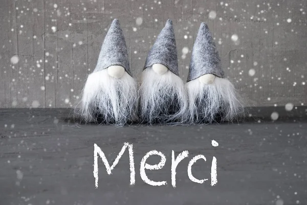 Three Gray Gnomes, Cement, Snowflakes, Merci Means Thank You — Stock Photo, Image