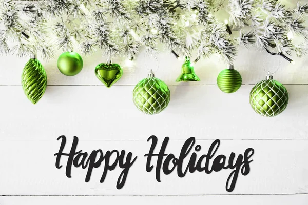 Gröna bollar, kalligrafi Happy Holidays, Fairy Lights — Stockfoto