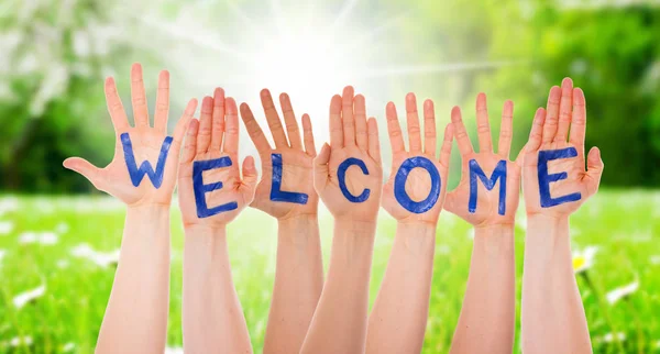 Many Hands Building Welcome, Sunny Grass Meadow — Stock Photo, Image