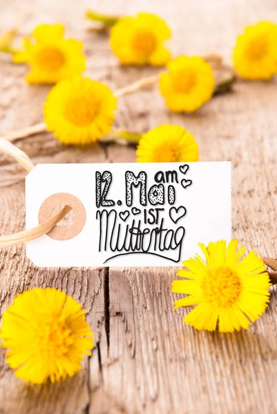 Etiqueta, Diente de León, Caligrafía Muttertag Significa Feliz Día de las Madres —  Fotos de Stock