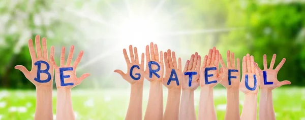 Many Hands Building Be Grateful, Sunny Grass Meadow — Stock Photo, Image