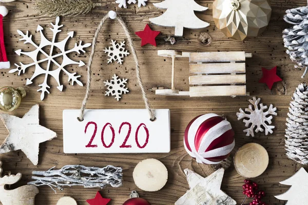 Natale rustico piatto laico, testo 2020, sfondo in legno — Foto Stock