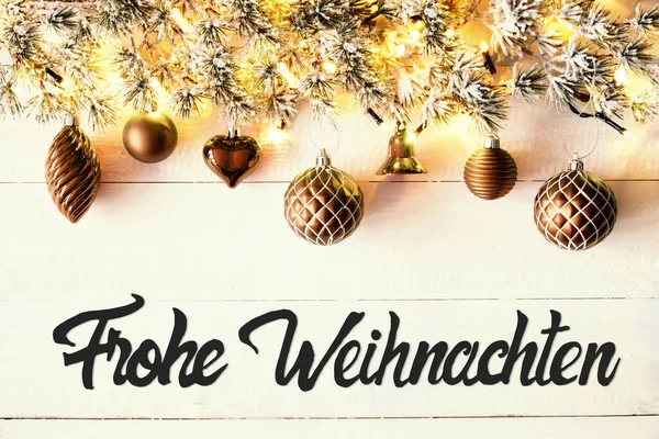 Bolas de bronce, Caligrafía Frohe Weihnachten significa Feliz Navidad — Foto de Stock
