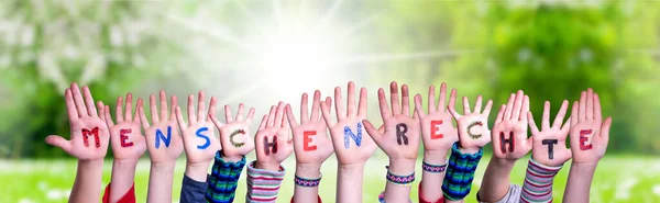 Children Hands Building Word Menschenrechte means Human Rights, Grass Meadow — 图库照片