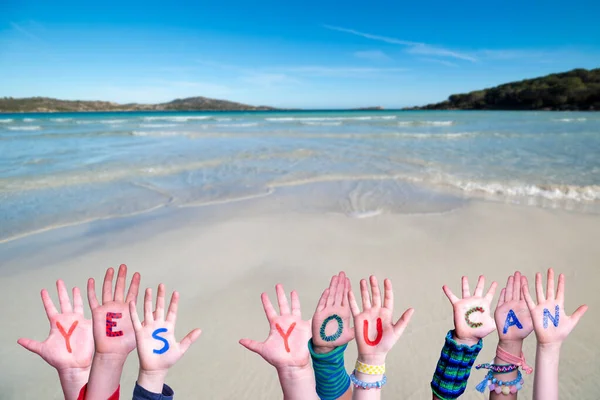 Children Hands Building Word Yes You Can, Ocean Background — Stock Photo, Image