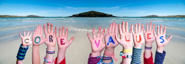 Children Hands Building Word Core Values, Ocean Background — Stock fotografie