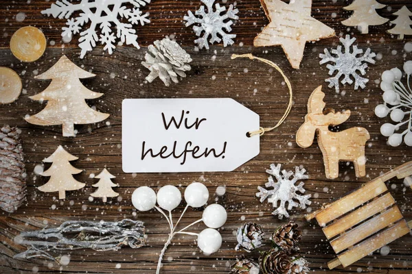Etiqueta, quadro de decoração de Natal, Wir Helfen significa que ajudamos, flocos de neve — Fotografia de Stock