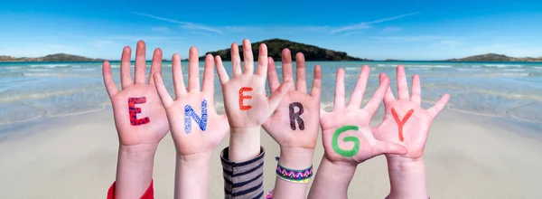 Barn händer bygga Word Energy, Ocean Bakgrund — Stockfoto
