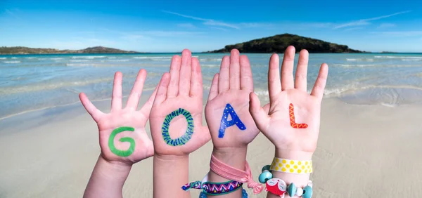 Niños Manos Construyendo Meta de Palabra, Fondo Océano —  Fotos de Stock