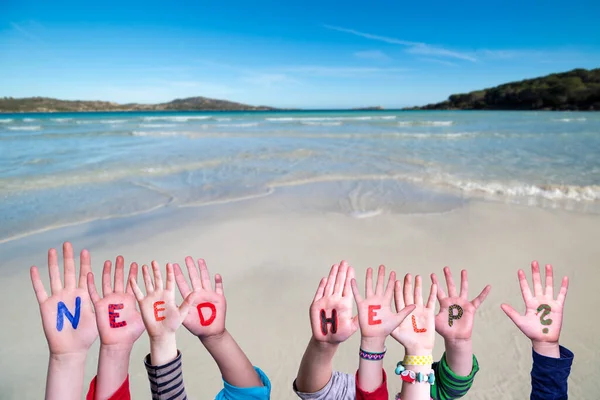 Niños Manos Construyendo la Palabra Necesitan Ayuda, Fondo Oceánico — Foto de Stock