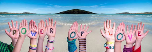 Children Hands Building Word Power Of Love, Ocean Background — Stock Photo, Image