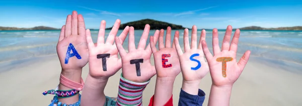 Children Hands Building Word Attest Means Attestation, Ocean Background — Stock Photo, Image