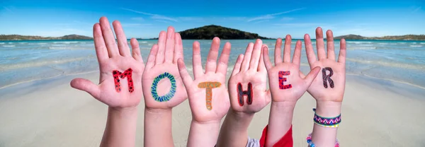 Children Hands épület Word Mother, Ocean Háttér — Stock Fotó