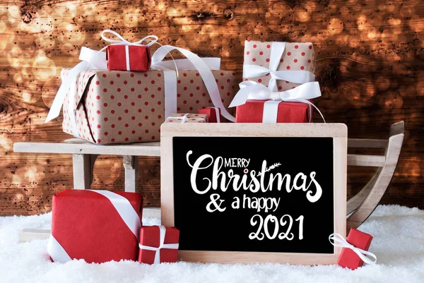 Sleigh, Presente, Neve, Bokeh, Feliz Natal e um feliz 2021 — Fotografia de Stock