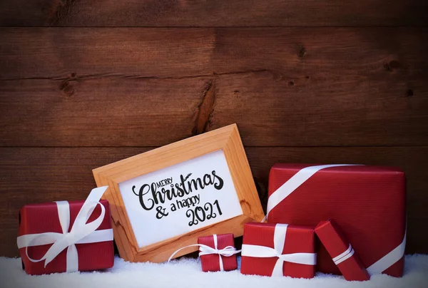 Marco, regalo rojo, nieve, Feliz Navidad y un feliz 2021 — Foto de Stock