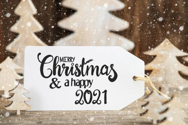 Albero di Natale, Etichetta con Buon Natale e Felice 2021, Fiocchi di neve — Foto Stock