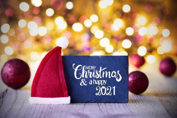 Parlak Işıklar, Top, Kırmızı Noel Baba Şapkası, Mutlu Noeller ve Mutlu 2021 — Stok fotoğraf