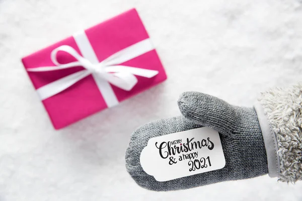 Gray Glove, Pink Gift, Label, Snow, Merry Christmas And A Happy 2021 — стокове фото