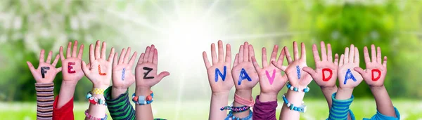 Children Hands Building Word Feliz Navidad Means Merry Christmas, Grass Meadow — Stock Photo, Image