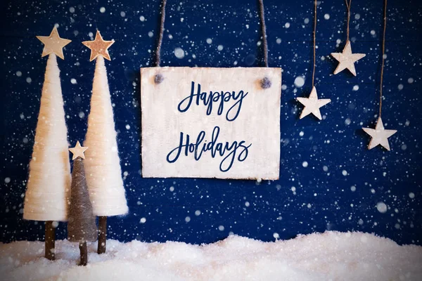 Karácsonyfa, kék háttér, hó, szöveg Boldog ünnepeket, hópelyhek — Stock Fotó