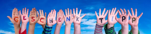Children Hands Building Word Geschenk Tipp Means Gift Tip, Blue Sky — Stock Photo, Image