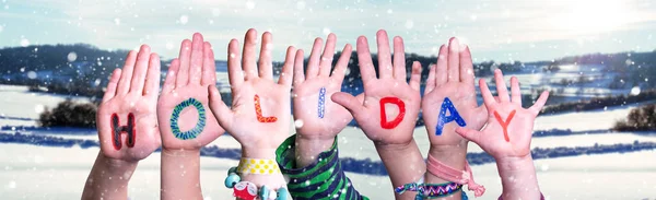 Crianças Mãos Construção Palavra Feriado, Inverno nevado fundo — Fotografia de Stock