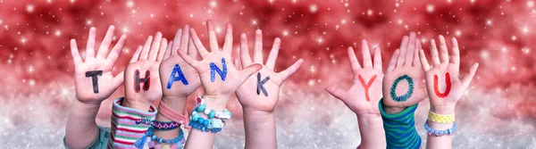 Children Hands Building Word Thank You, Red Christmas Background — Stock Photo, Image