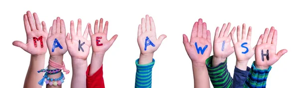 Crianças mãos construindo palavra fazer um desejo, fundo isolado — Fotografia de Stock