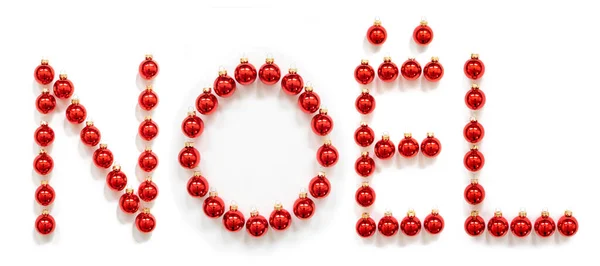 Adorno rojo de la bola de Navidad Construcción Palabra Noel significa Navidad — Foto de Stock