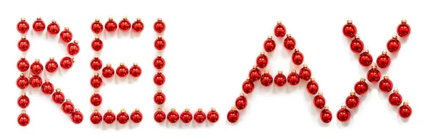 赤いクリスマスボールの装飾単語リラックス — ストック写真