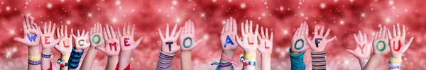 Children Hands Building Word Welcome To All Of You, Red Christmas Background — Stock Photo, Image