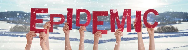 People Hands Holding Word Epidemic, Snowy Winter Background — Stok Foto