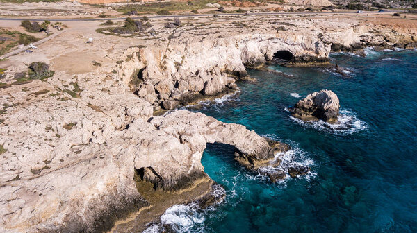 aerial view of dramatic rocky coast with blue sea, Cyprus