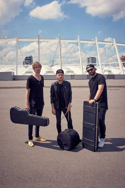 Rock Music Band Musical Instruments Cases Standing Street — Free Stock Photo