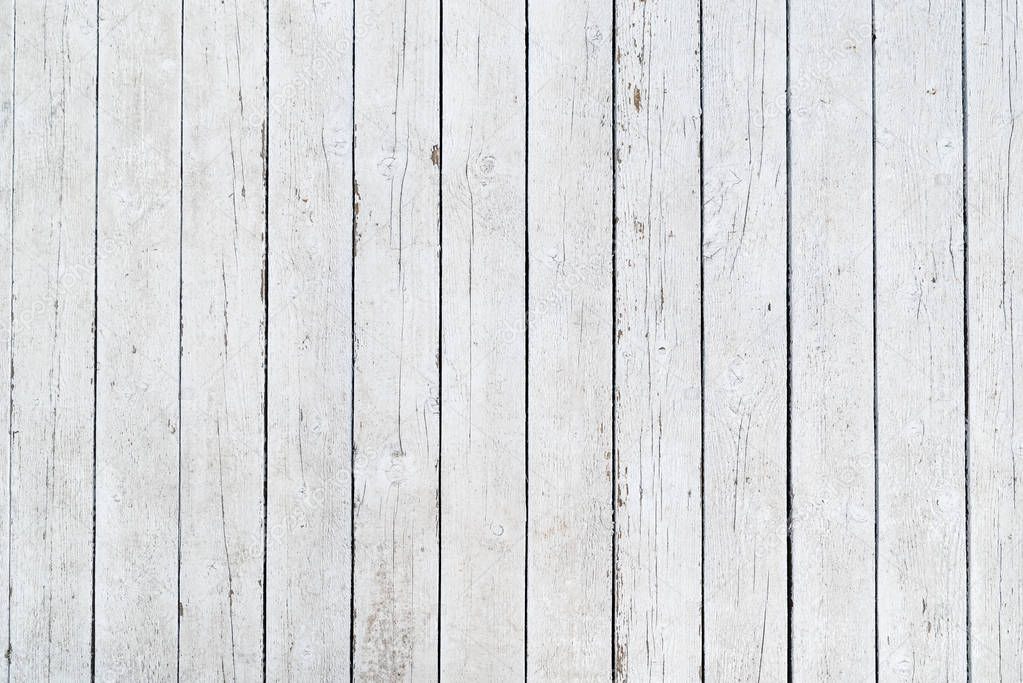 White texture of wooden boards with black slits