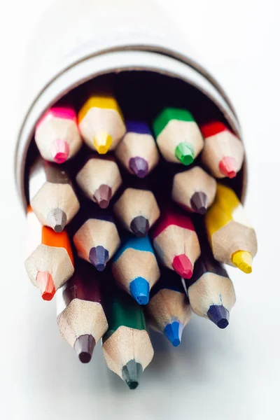 round tube, pencil case with a set of colored wooden pencils for drawing