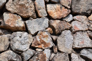 Büyük taş dokusuna oluşan duvar