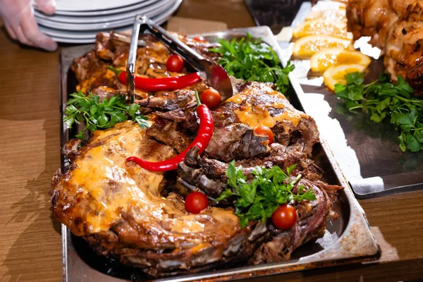 Baked meat on a metal tray — Stock Photo, Image