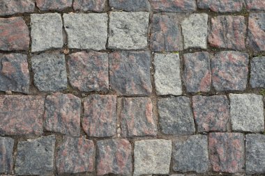 Taş kaldırım dokusu, granit cobblestoned kaldırım arka plan, Arnavut kaldırımlı taş yol düzenli şekilleri, eski kaldırım taşı kaldırım yakın çekim arka plan