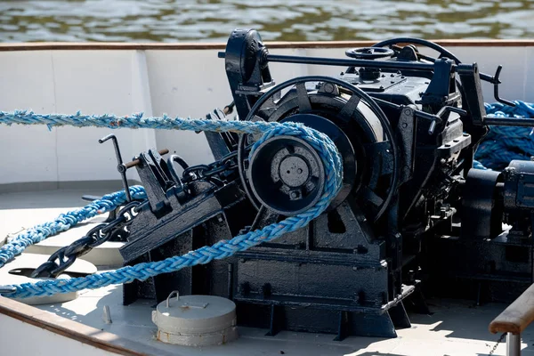 Anchor lifting mechanism engine on top of the boat.