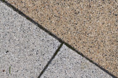 Mozaik tarafından yakın plan kaldırım levhaları. Yol döşeme, inşaat. Tesselled kaldırım taşı. Gri asfalt