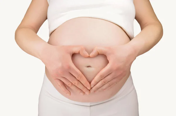 Pregnant Woman Forming Heart Shape Her Hands Her Stomach White — Stock Photo, Image