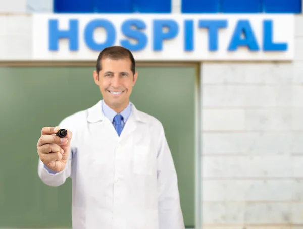 Close Hand Writing Something Unseen Board Next Hospital Building — Stock Photo, Image