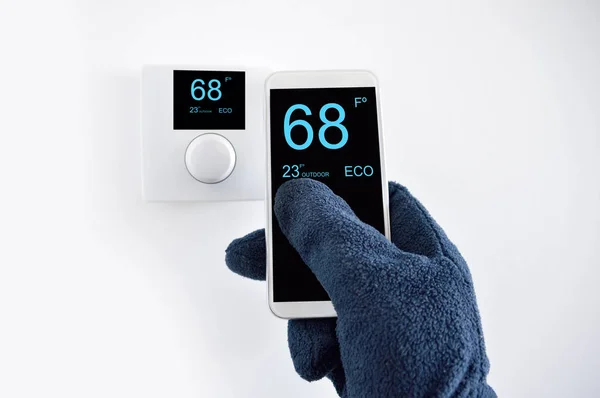 Regulating Temperature Smartphone Controlling Digital Thermostat Finger Pressing Button — Stock Photo, Image